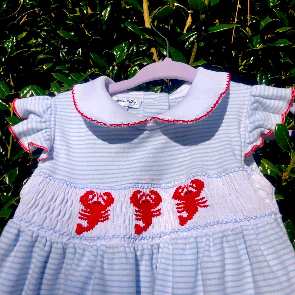 Like new smocked dress. It was only worn a couple of times!